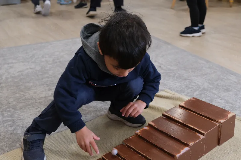 child playing with blocks